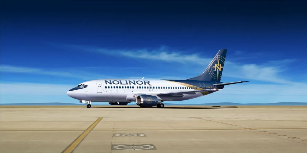A Noliner aircraft is parked on a runway under a clear blue sky, showcasing its distinctive branding and design.